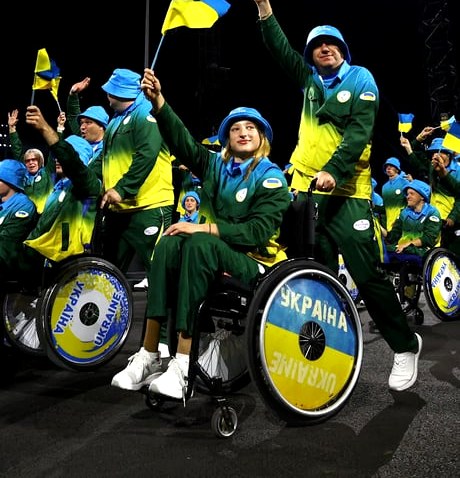 Ukraine vs Thailand Paralympic fencing — custom wheel covers