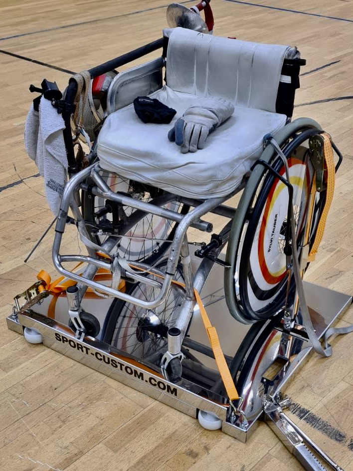 Custom Sports fencing frame — wheelchair secured on frame SPORT-CUSTOM.COM